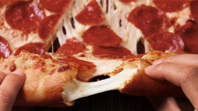 How Domino’s, Pizza Hut, Little Caesars, and Papa John’s Battled for Dough-mination in the 80s & 90s